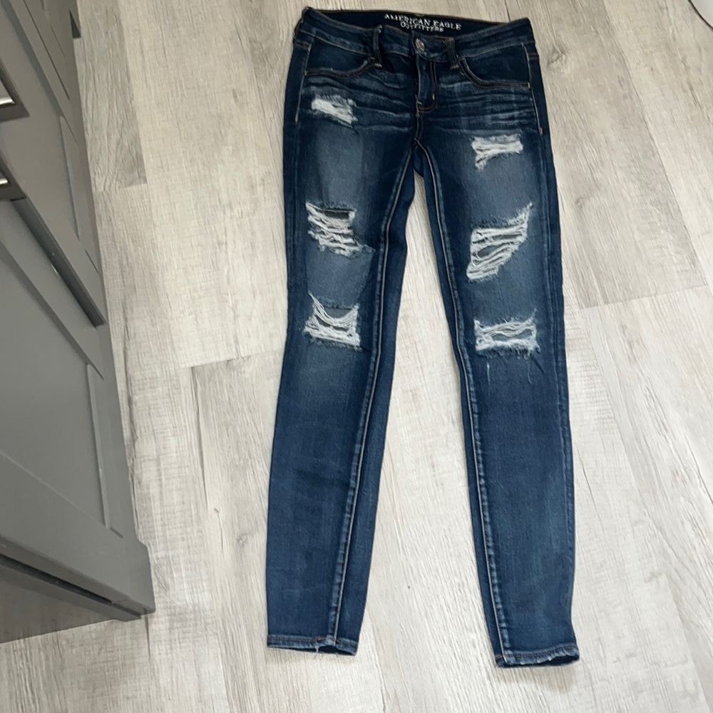 American Eagle Outfitters, Super Stretch, Super Low Jegging distressed size 4